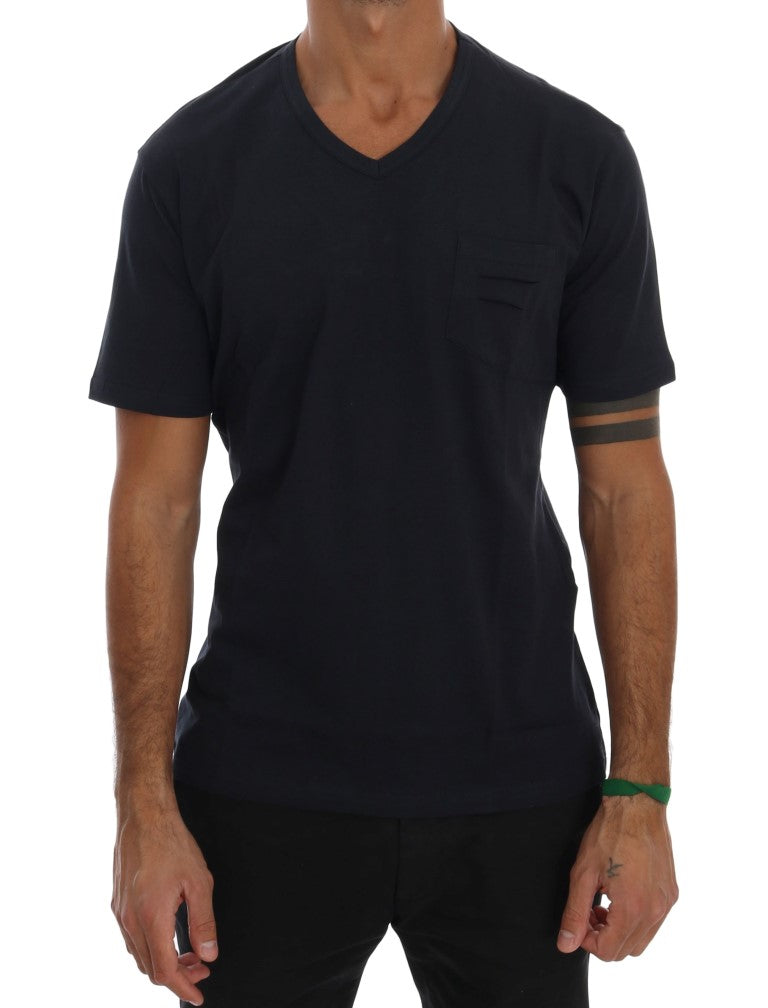 Man wearing dark blue t-shirt with short sleeves