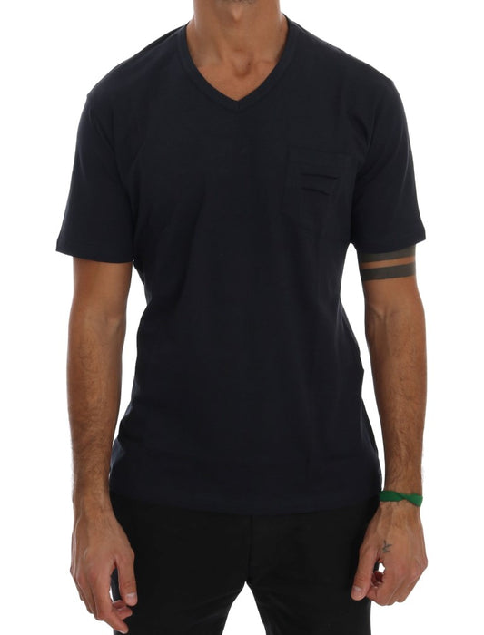 Man wearing dark blue t-shirt with short sleeves