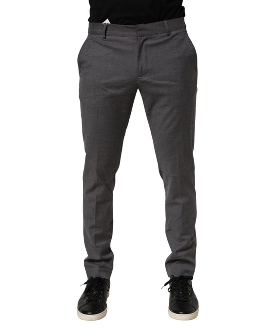 A pair of gray polyester formal dress trousers