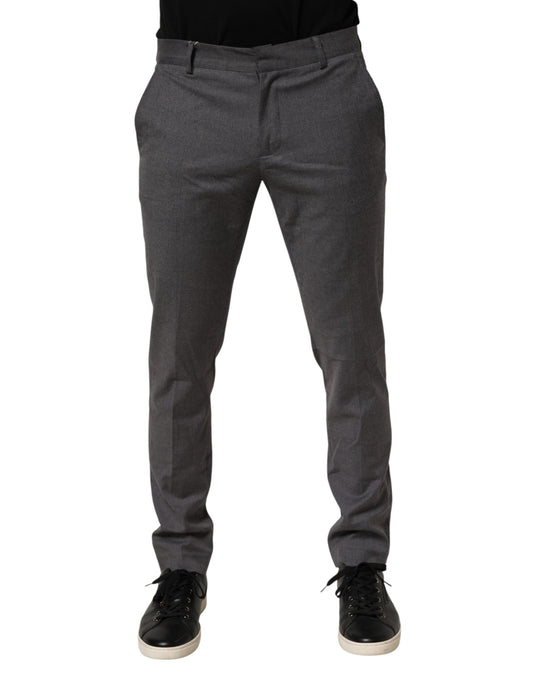 A pair of gray polyester formal dress trousers with a flat front design