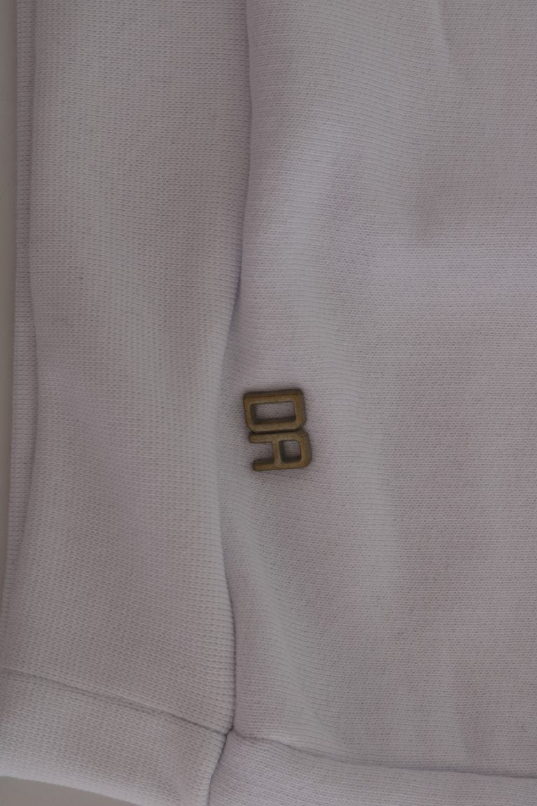 White shirt with gold emblem on sleeve