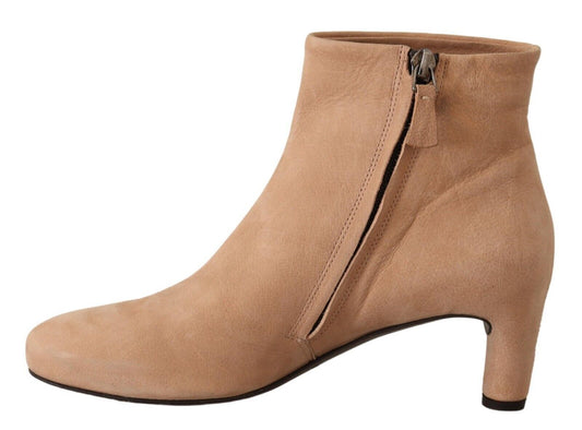 Tan suede women's boot with zipper detail and high heel