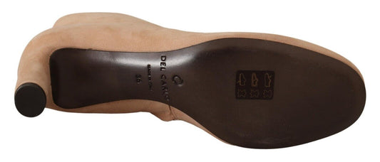 Brown leather shoe with black sole and heel