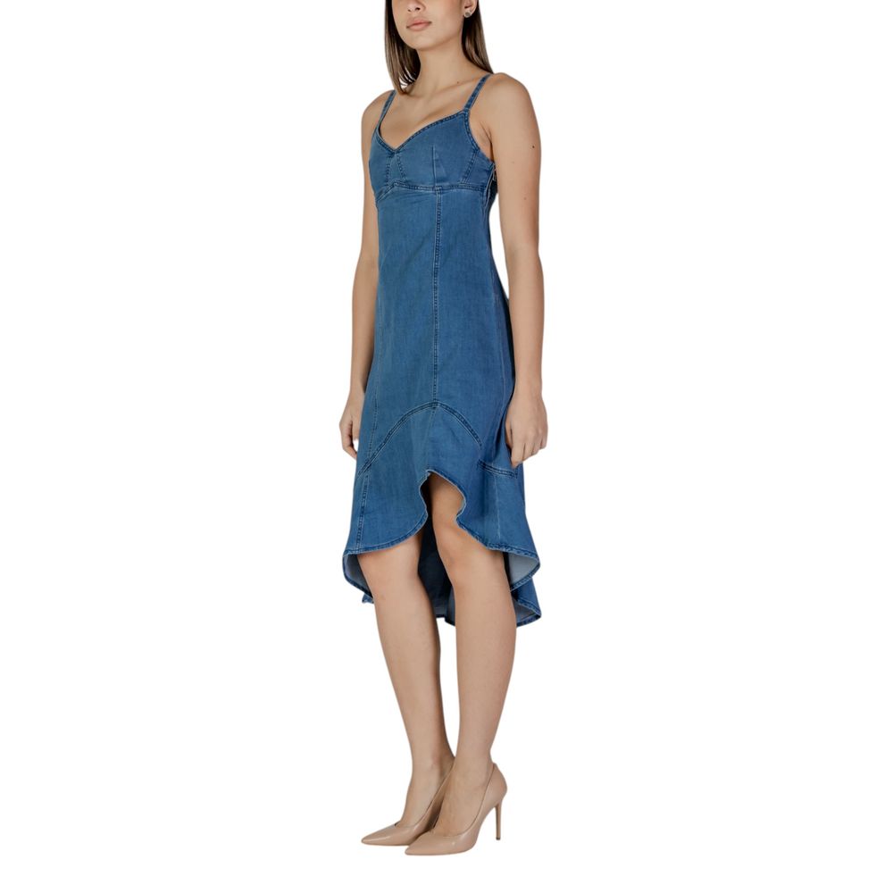 A long denim dress with a flared skirt