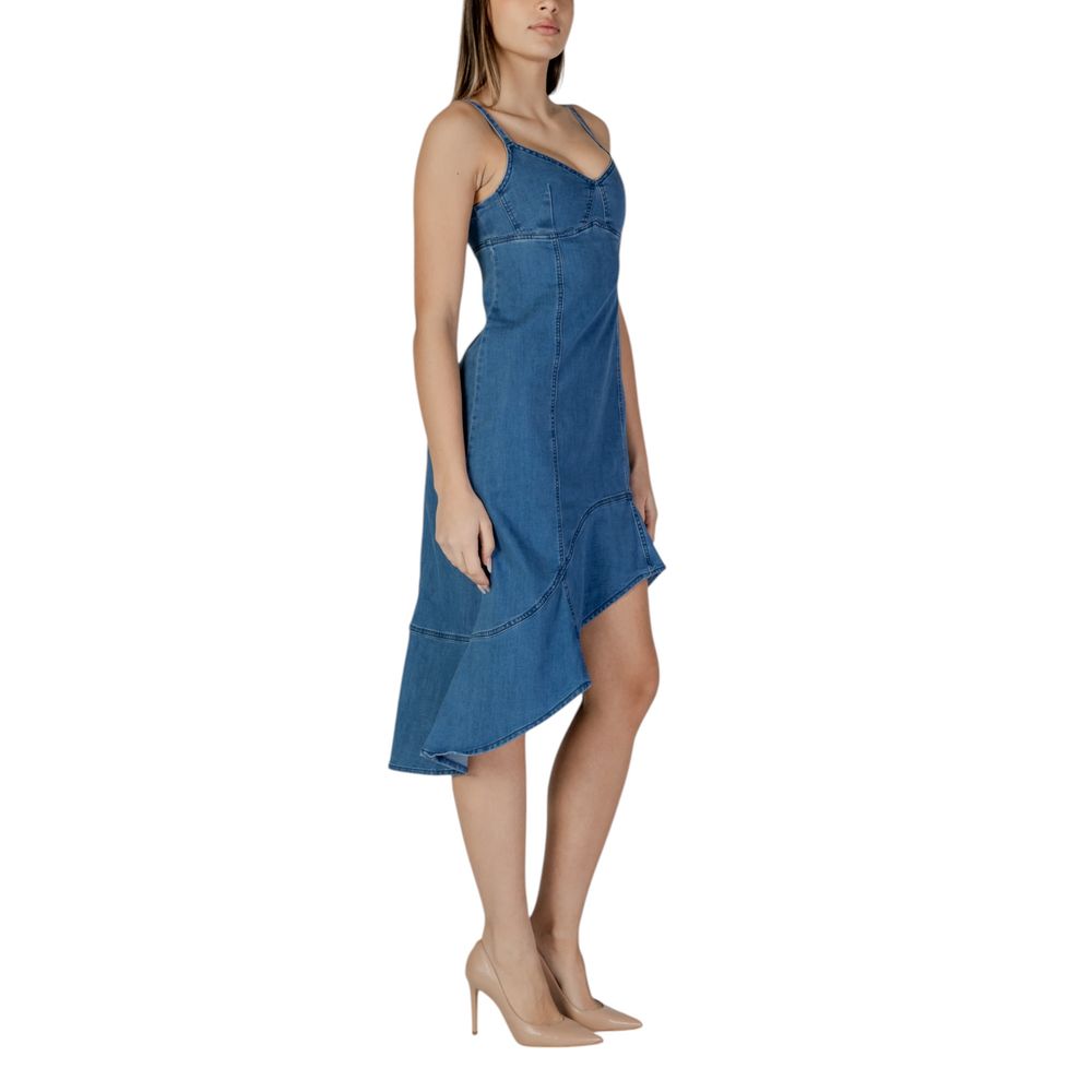 A long denim dress with a flared skirt