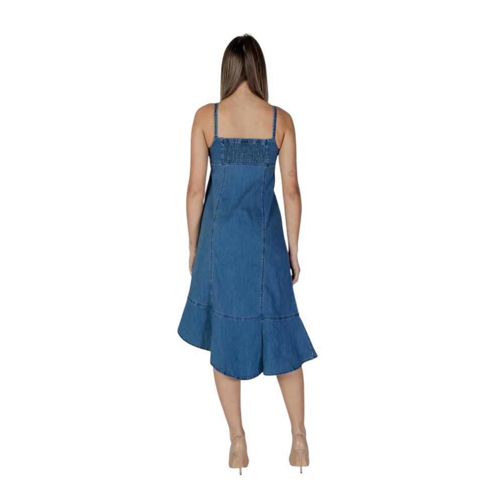 A long denim dress with a flared skirt