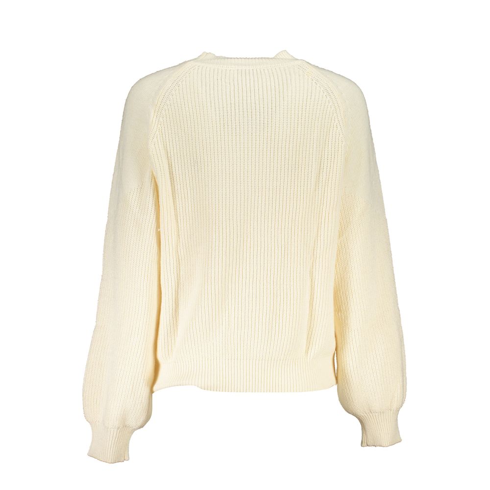 Yellow knitted sweater on a mannequin