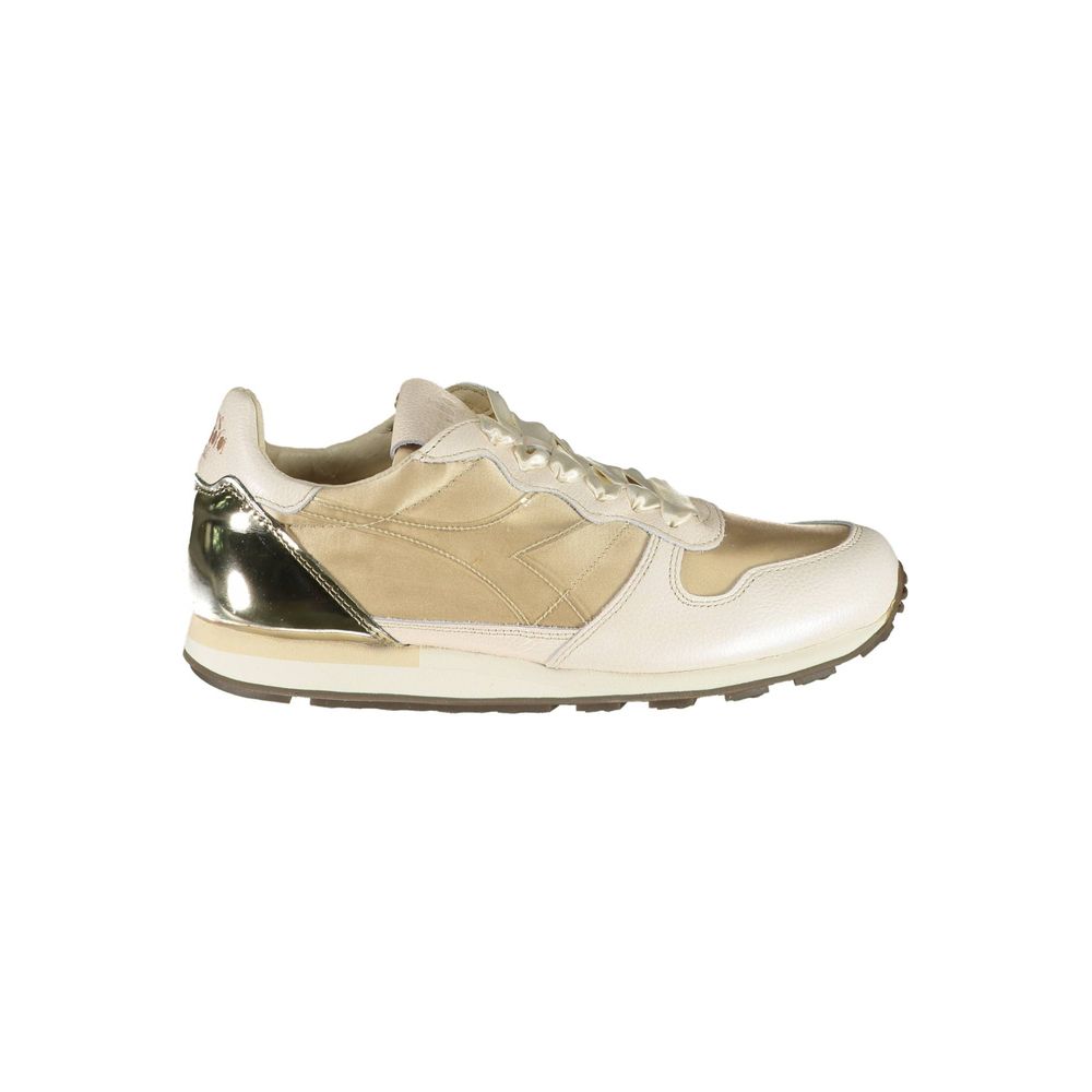White and gold sneakers with laces