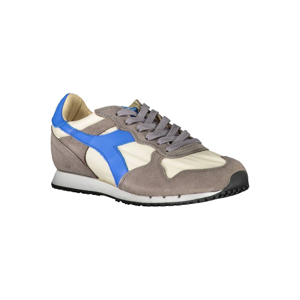 A pair of women's sneakers with a blue stripe on the side, featuring laces and a flat sole