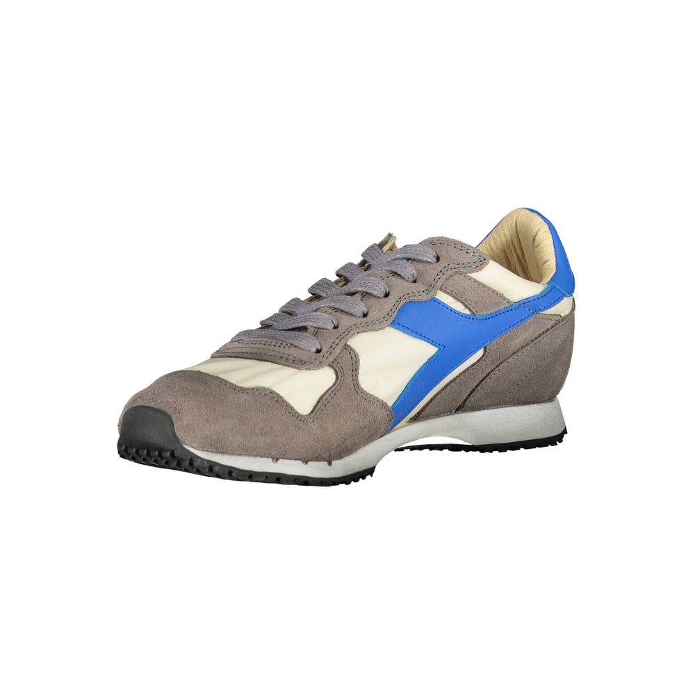 Brown leather women's sneaker with blue accents, laces, and sole