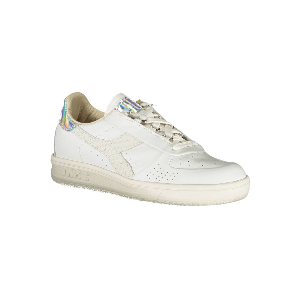 A white leather women's sneaker with a colorful design on the side, featuring laces and a flat sole