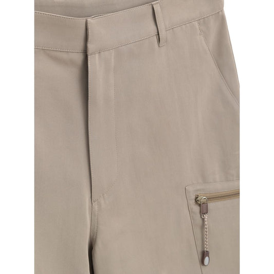 Tan pants with pockets and zippered pocket on left leg