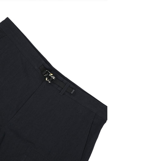Pair of dark blue trousers with a zipper fly