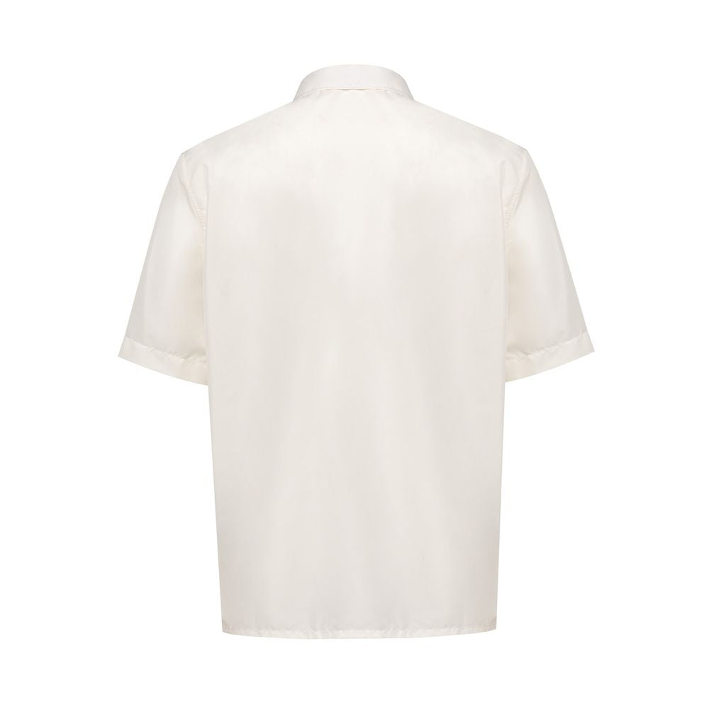 A white short sleeve shirt with a collar