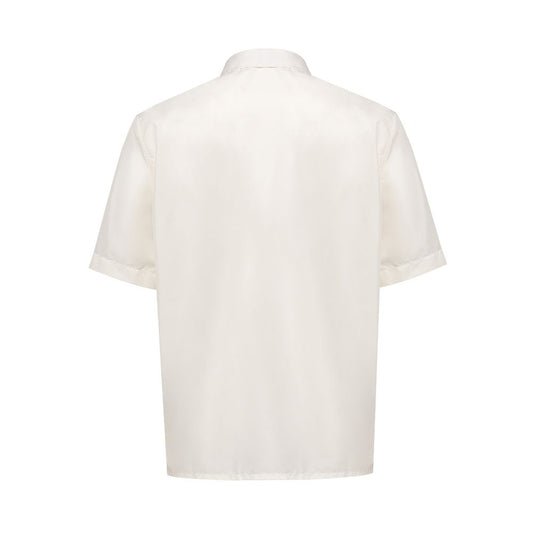 A white short sleeve shirt with a collar