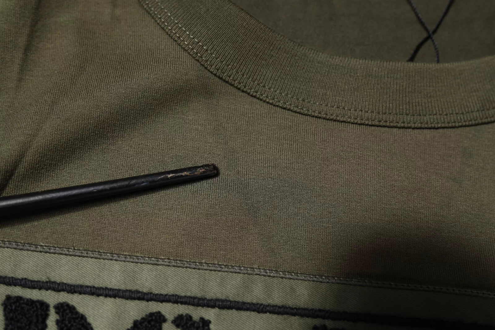 Camouflage shirt on hanger