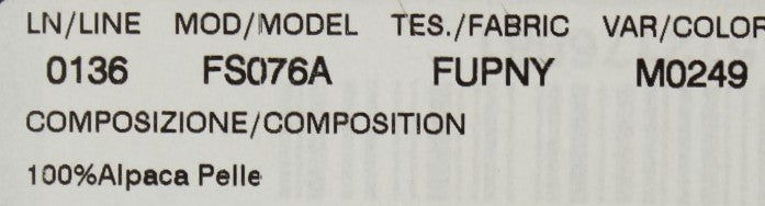 A label on a fabric item. It includes information such as the model number, color code, and possibly other de