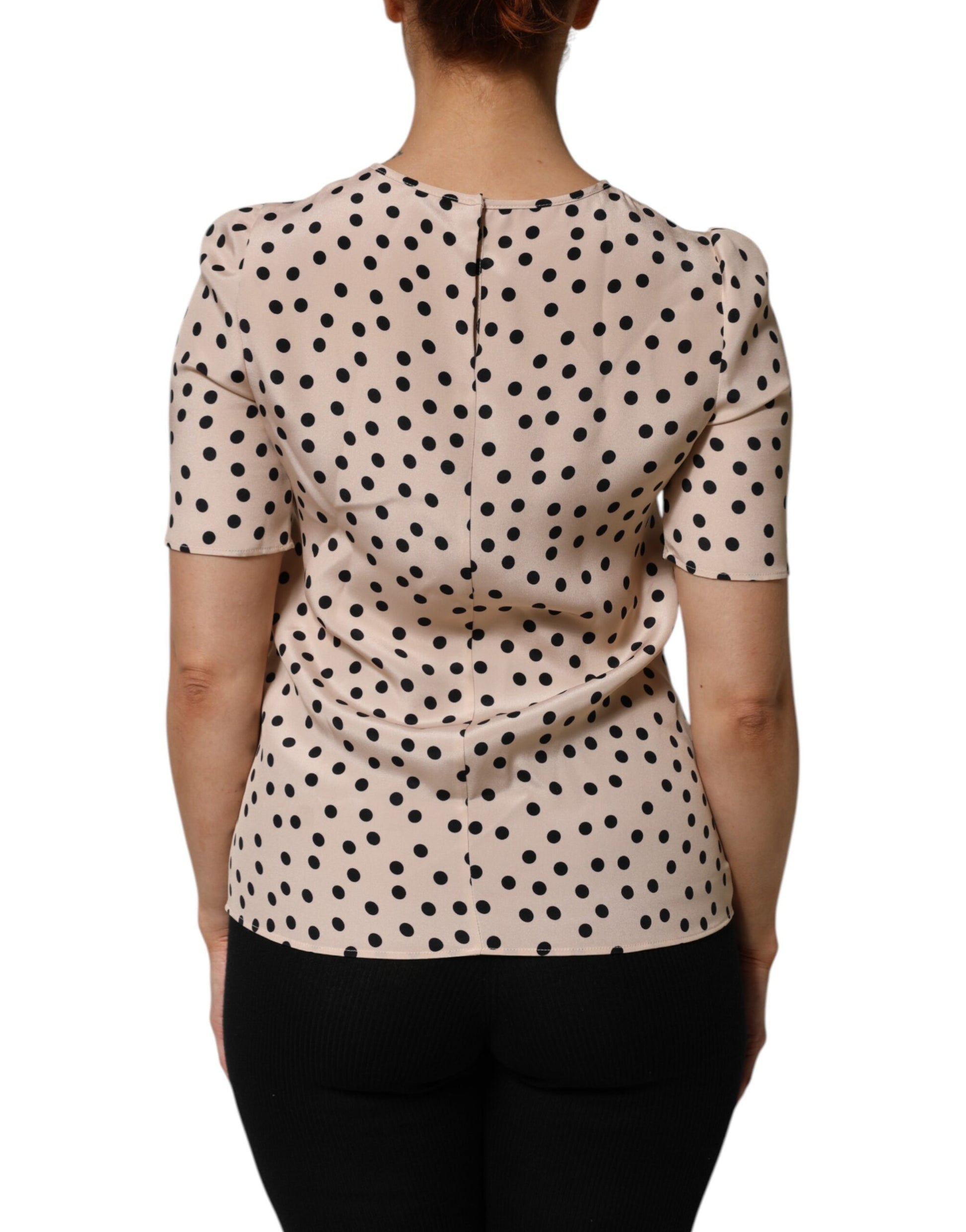 Woman wearing polka dot blouse