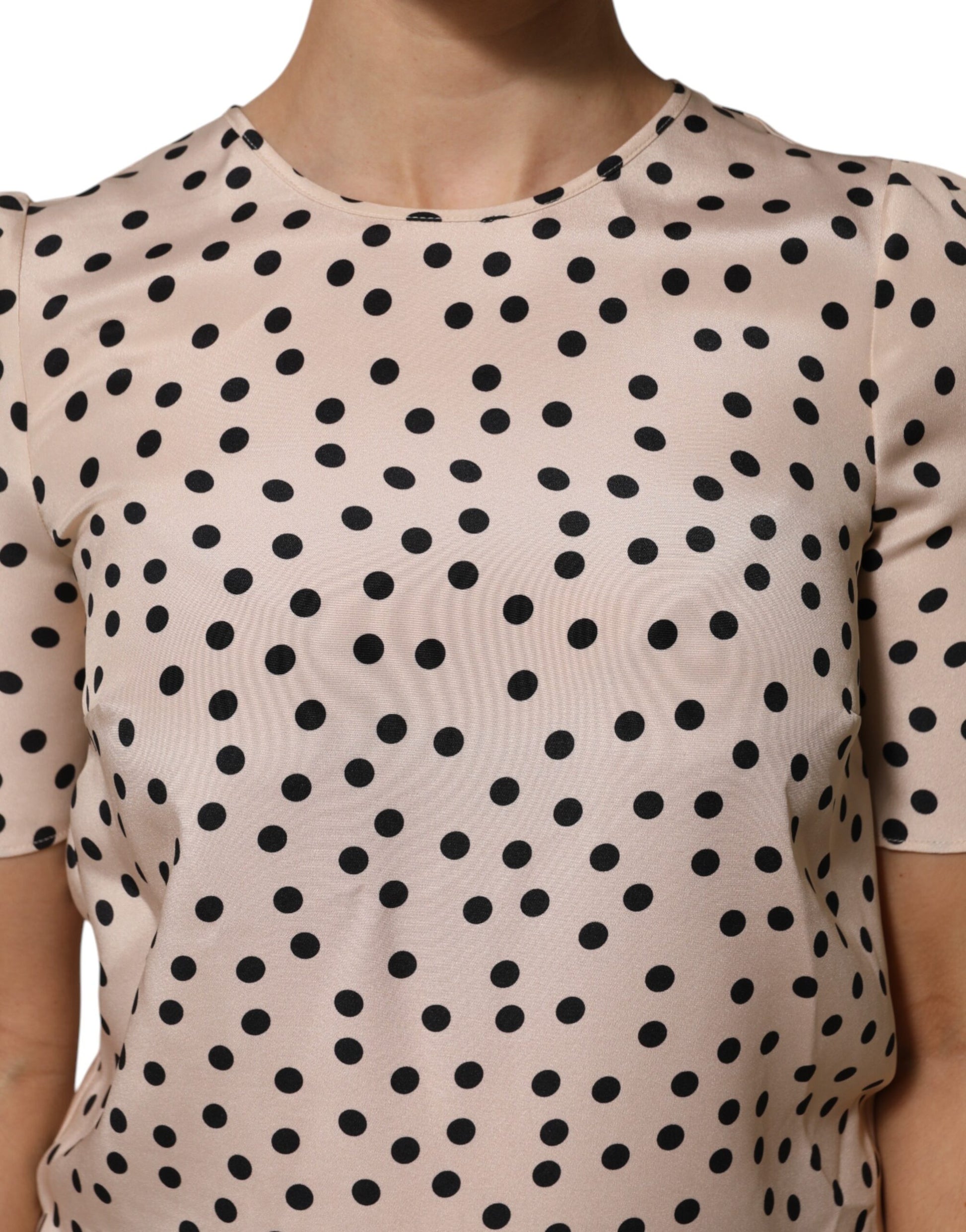 Pink blouse with black polka dots