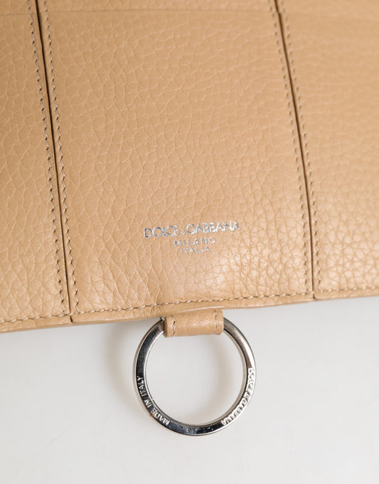 Brown leather handbag with metal ring closure