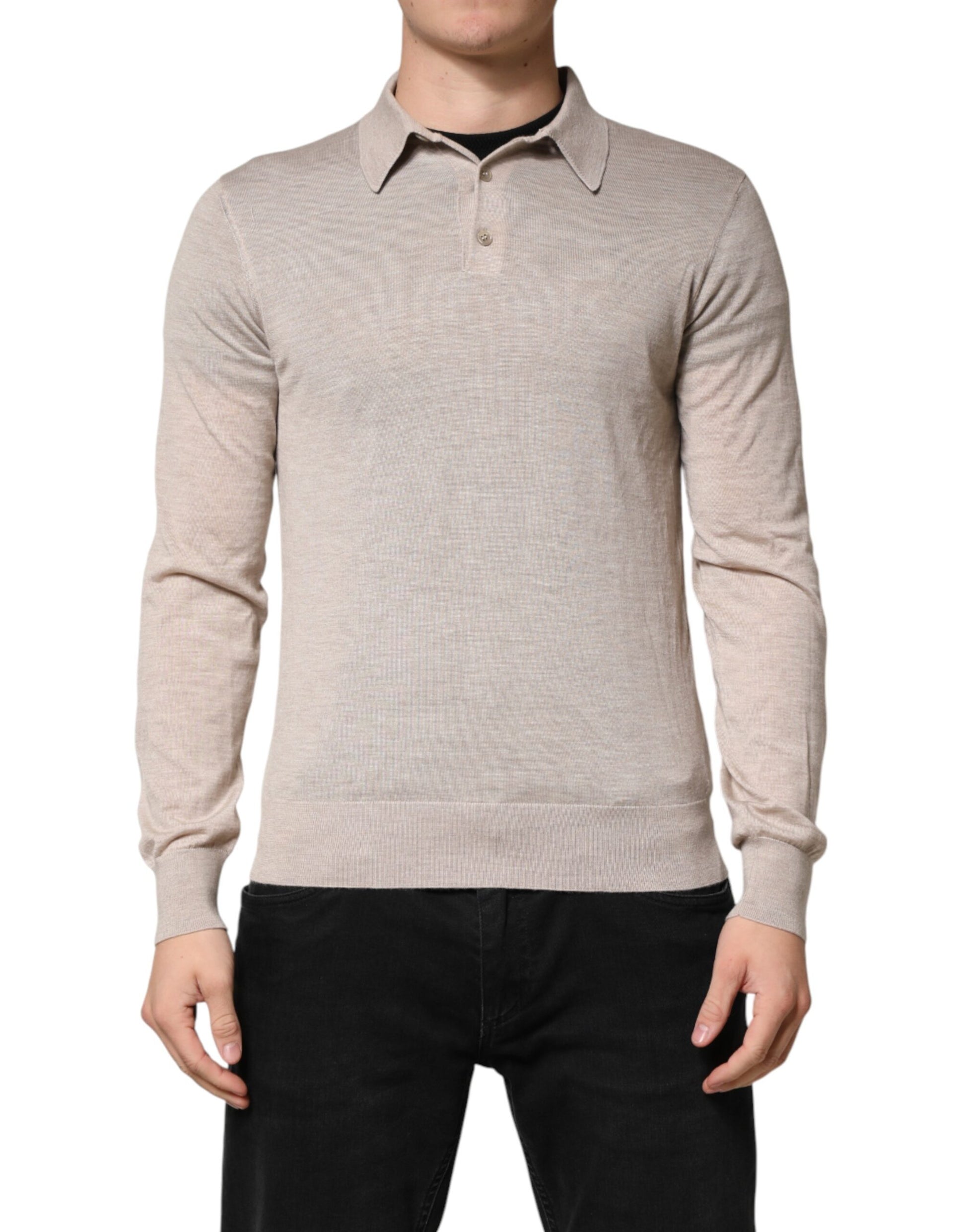 Mannequin wearing a beige sweater vest