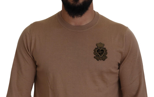 Brown sweater with embroidered emblem on chest