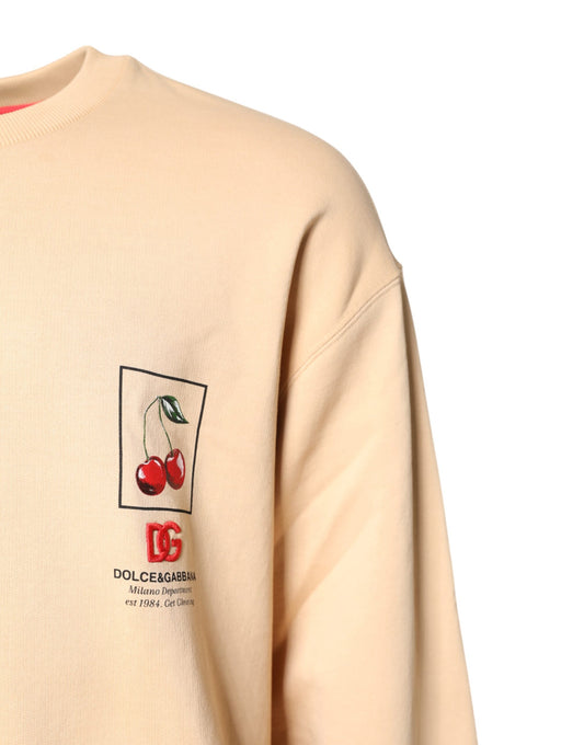 Tan sweatshirt with cherry logo on front