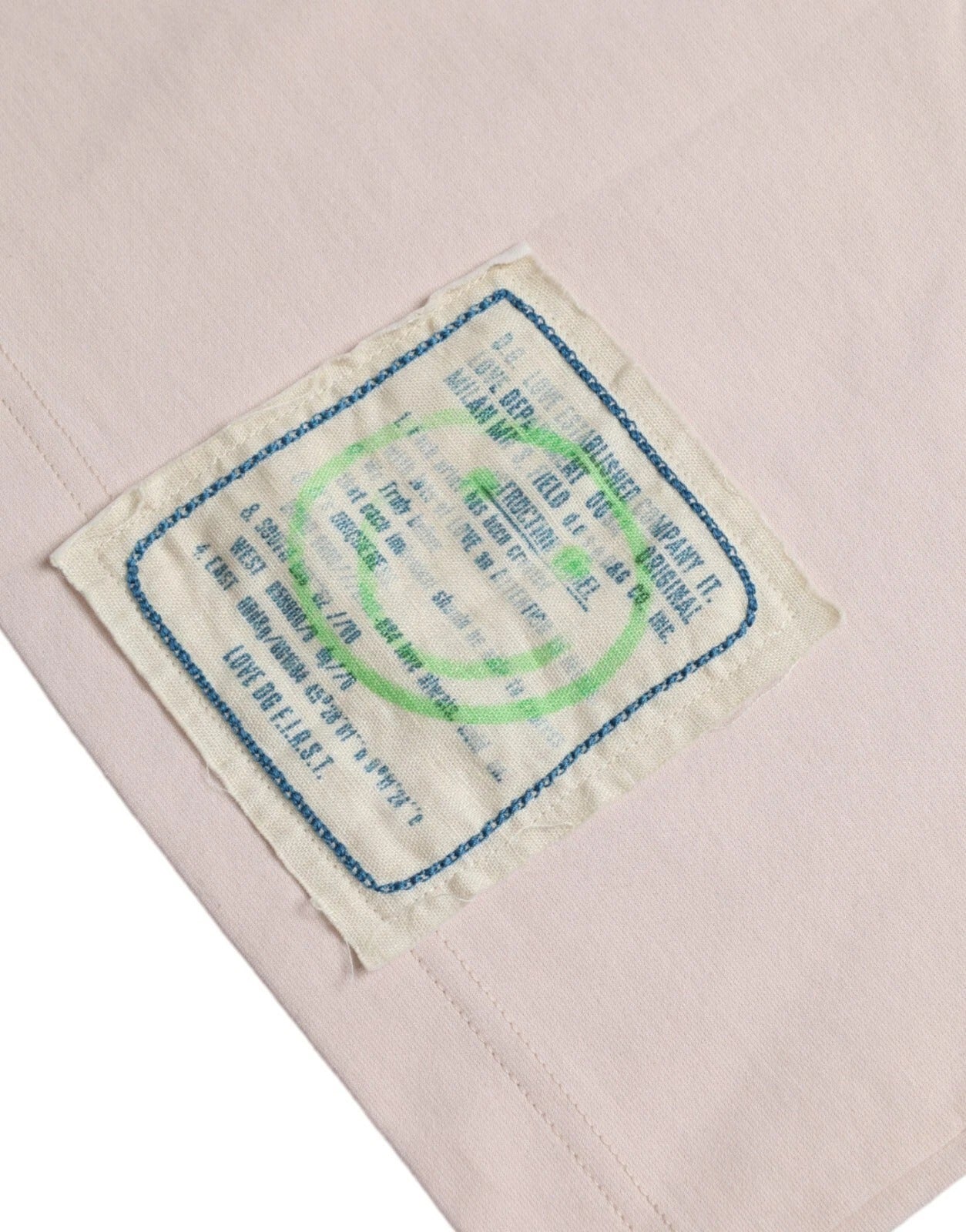 Pink fabric with blue label