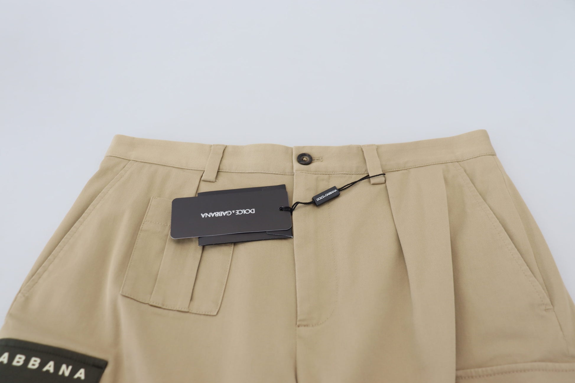 Tan cargo pants with pockets on front