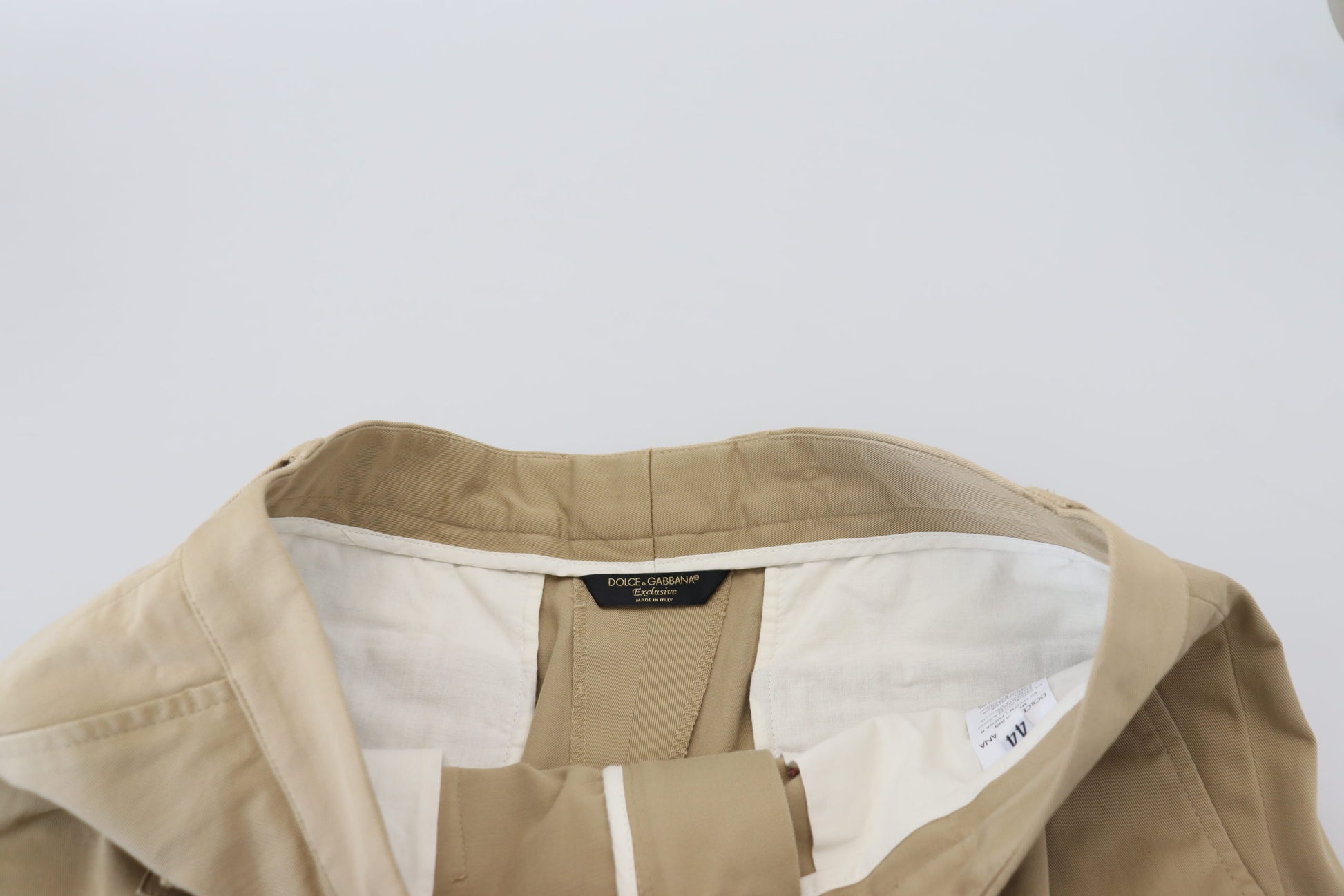 Tan jacket with zippered front closure