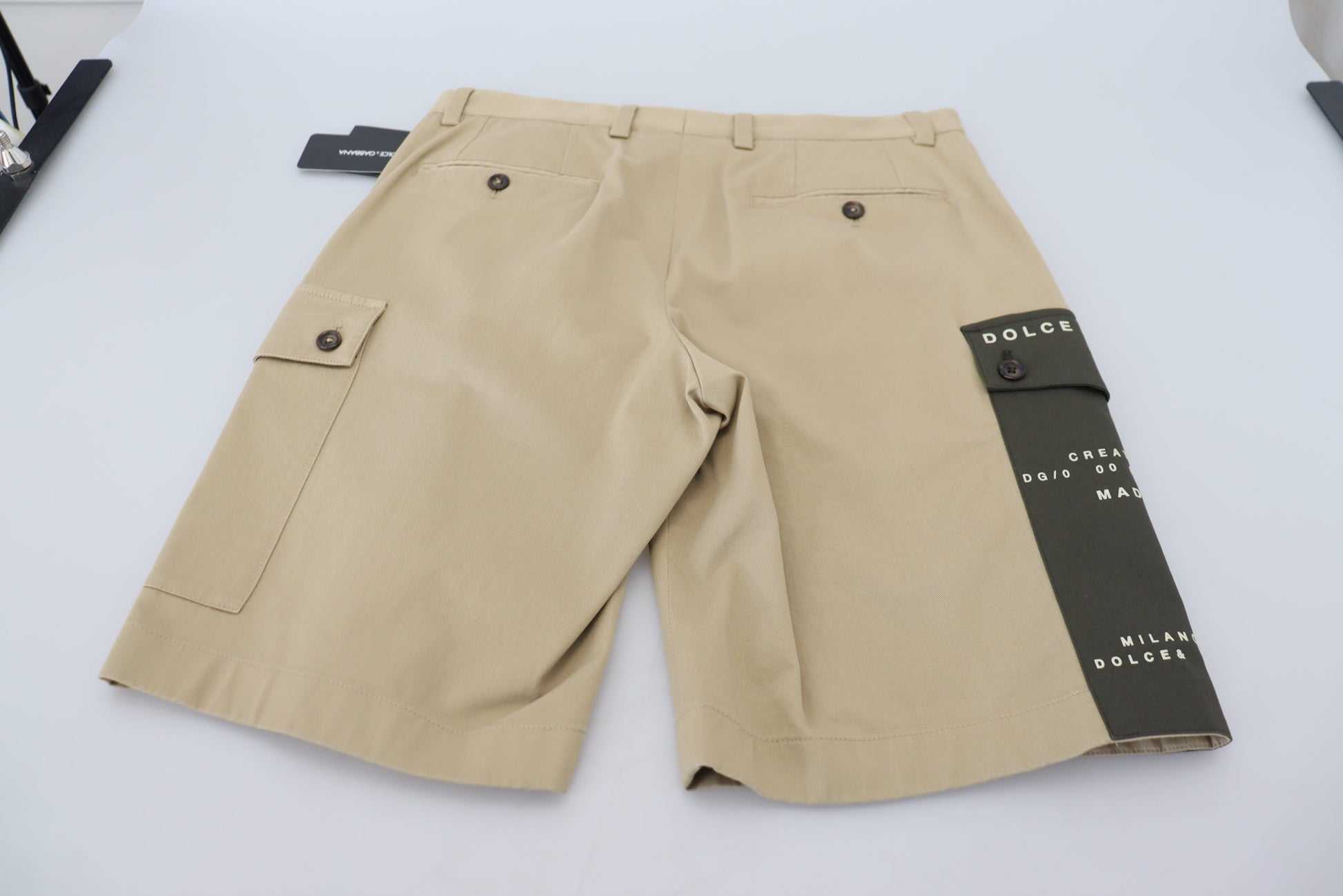 Tan cargo shorts with pockets on sides