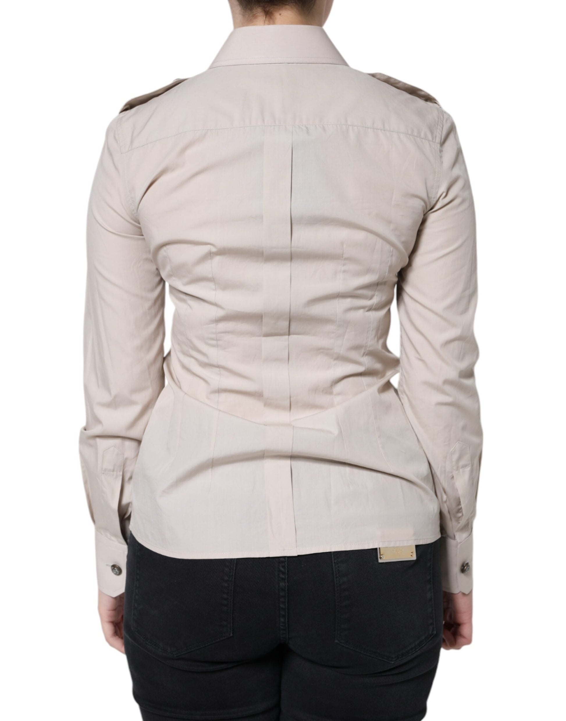 Tan jacket on woman's back