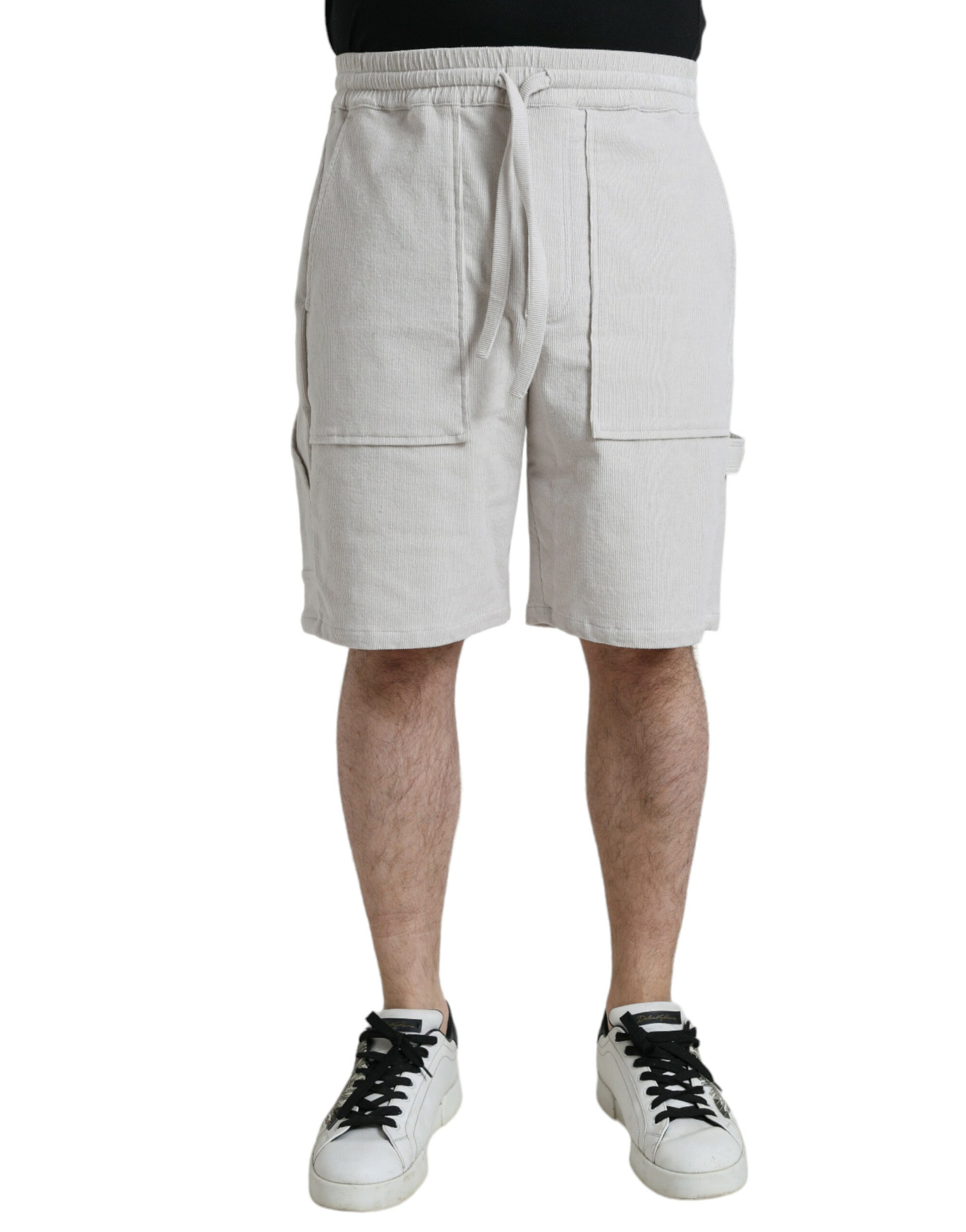 Man wearing shorts and sneakers