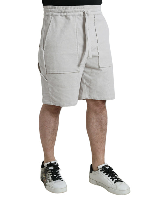 Man wearing shorts and sneakers