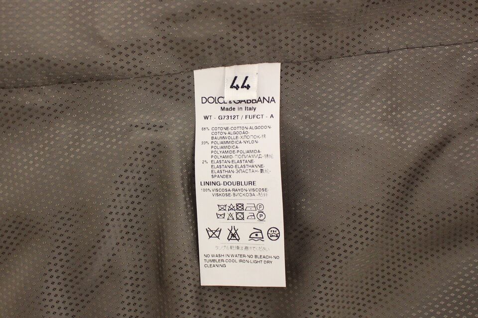 A beige cotton vest from Dolce & Gabbana, part of a suit or tailored jacket