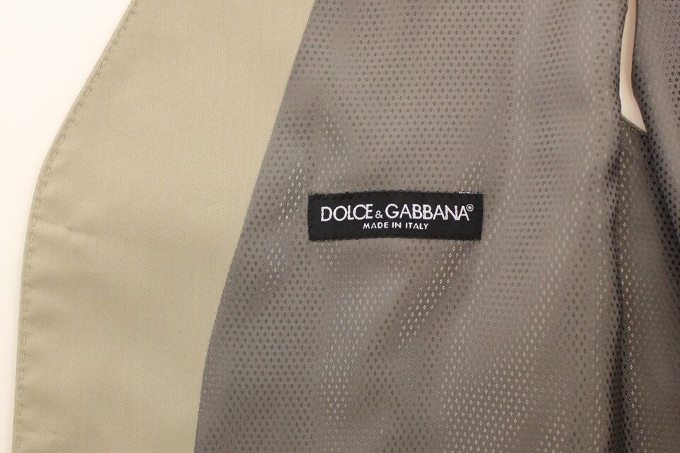 A beige cotton vest from Dolce & Gabbana, featuring a mesh texture and the brand's logo