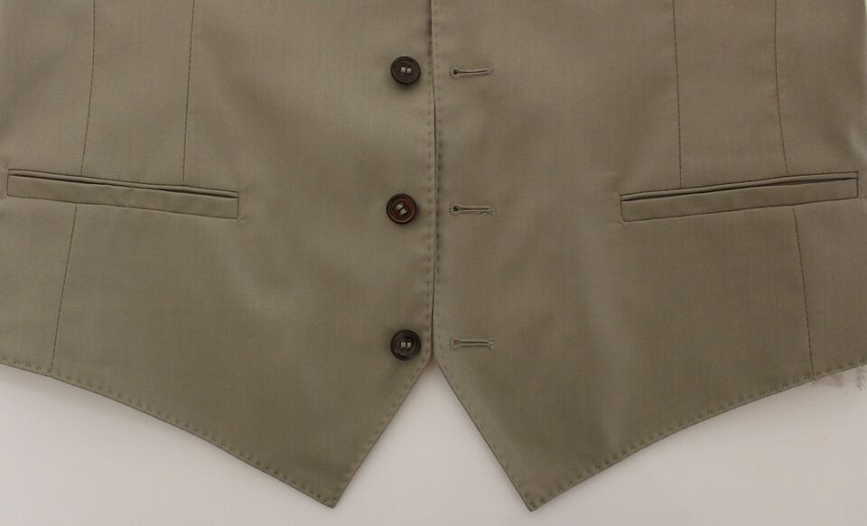 Tan cotton vest with two buttons, side pockets and a notched collar
