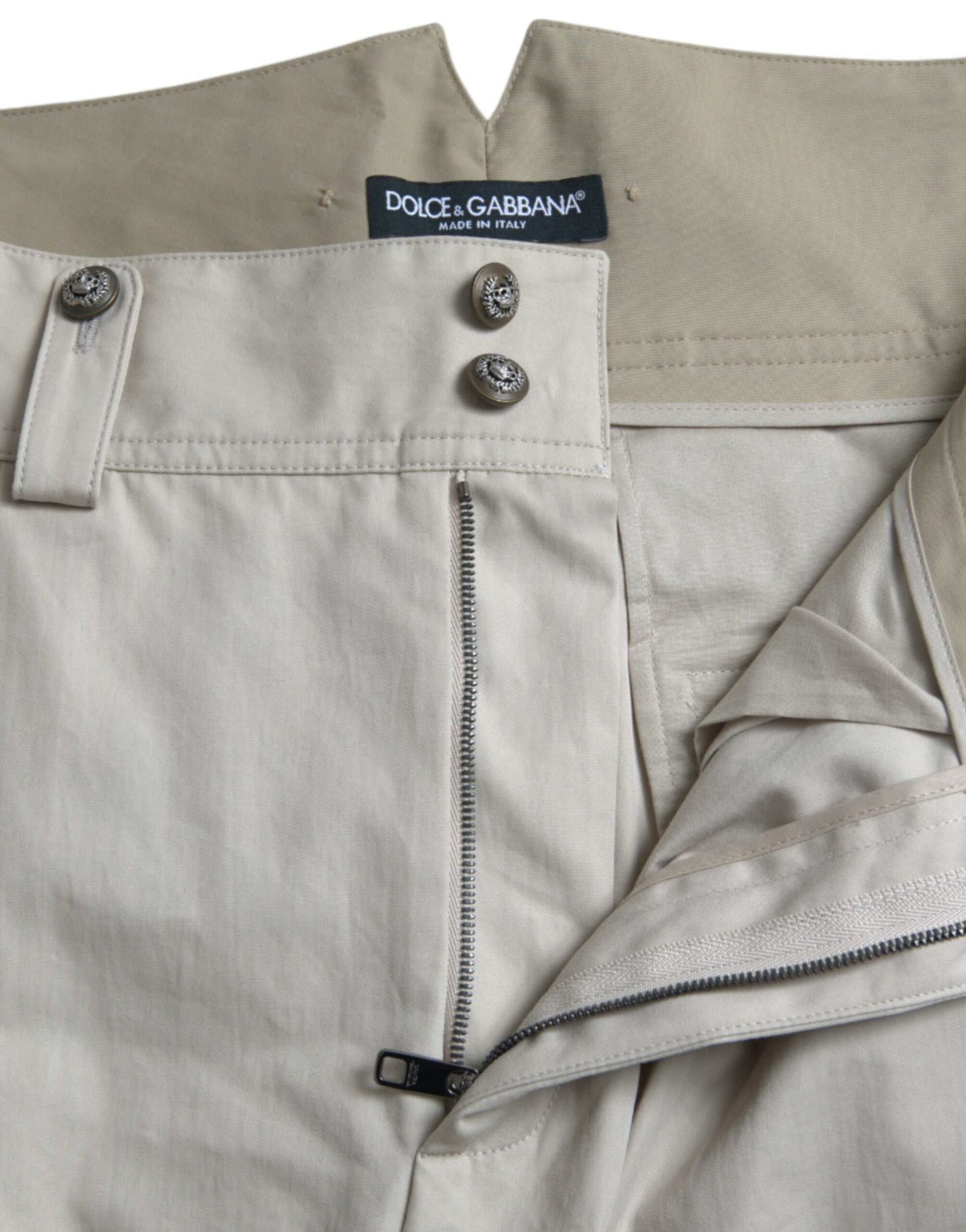 Tan pants with zippered side pockets
