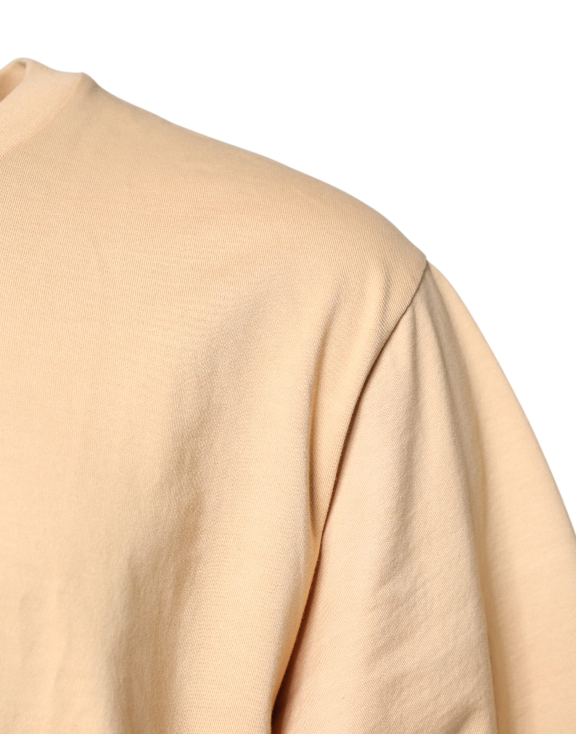 Tan long sleeve sweater on mannequin