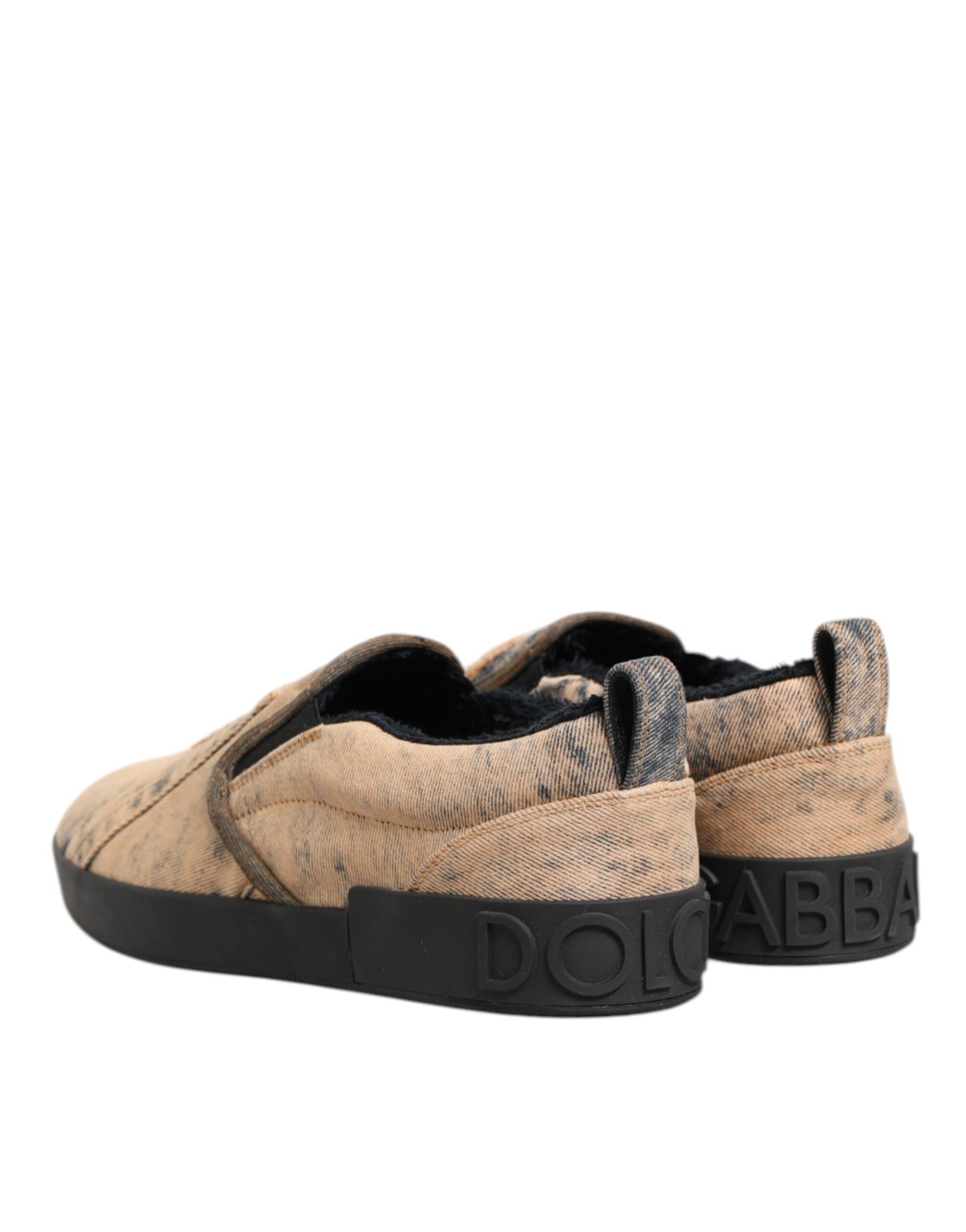 Pair of brown baby shoes with black soles