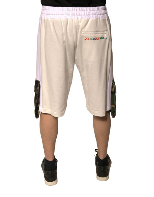 A pair of men's casual cargo shorts in beige cotton. They feature the Dolce & Gabbana logo on the left leg an