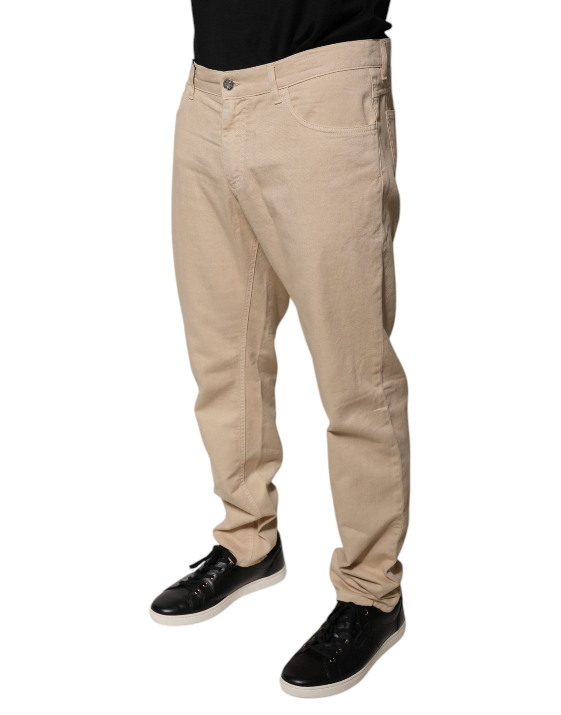 Man wearing khaki pants and black shoes