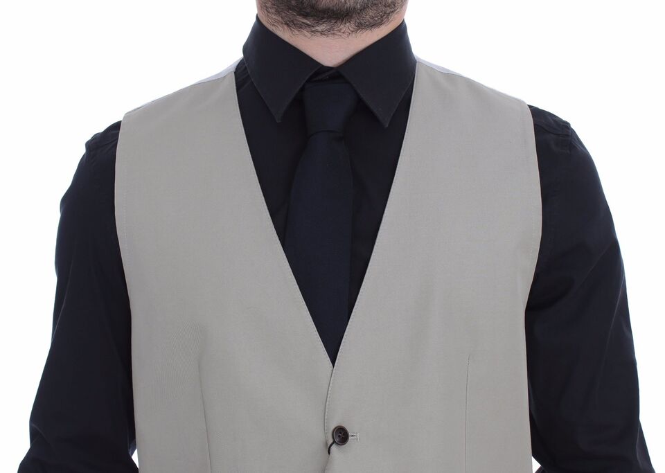 A beige cotton silk blend vest blazer with a black shirt underneath