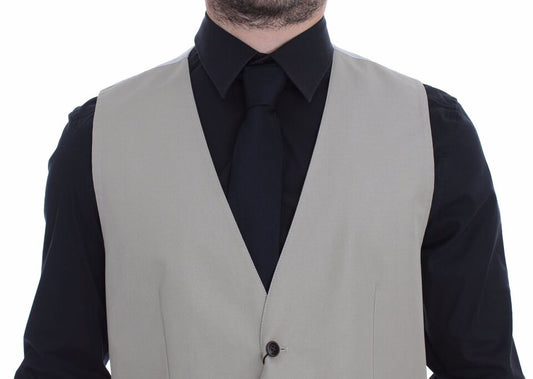 A beige cotton silk blend vest blazer with a black shirt underneath