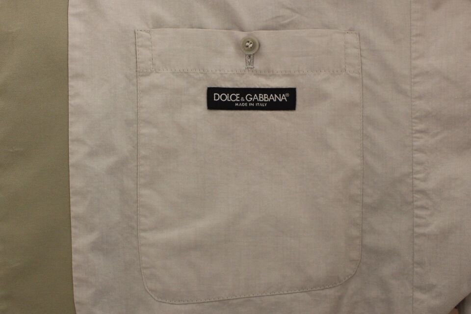 A beige cotton silk blend vest from Dolce & Gabbana