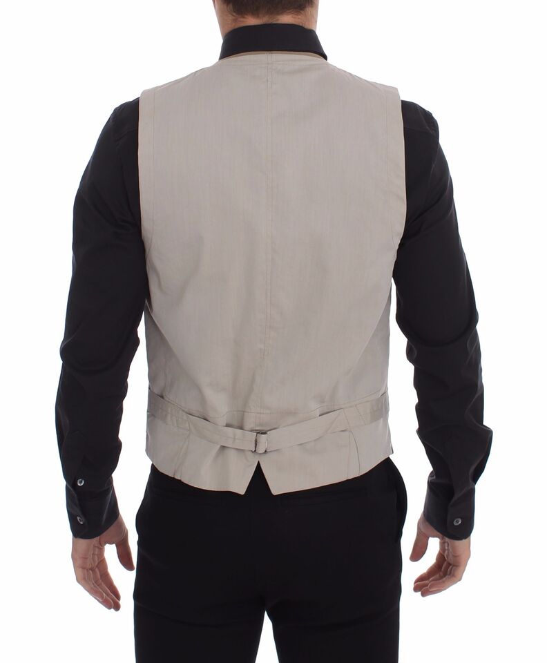 A beige cotton vest with a slim fit and button front