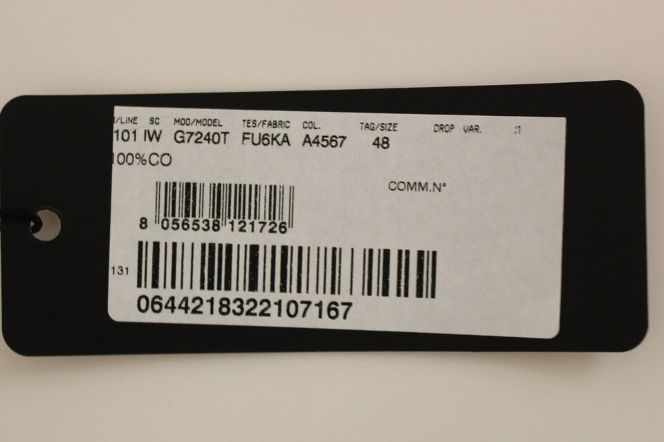 Black vest with white text and barcode