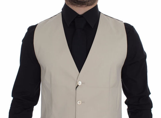 A beige cotton stretch vest blazer with a black shirt underneath