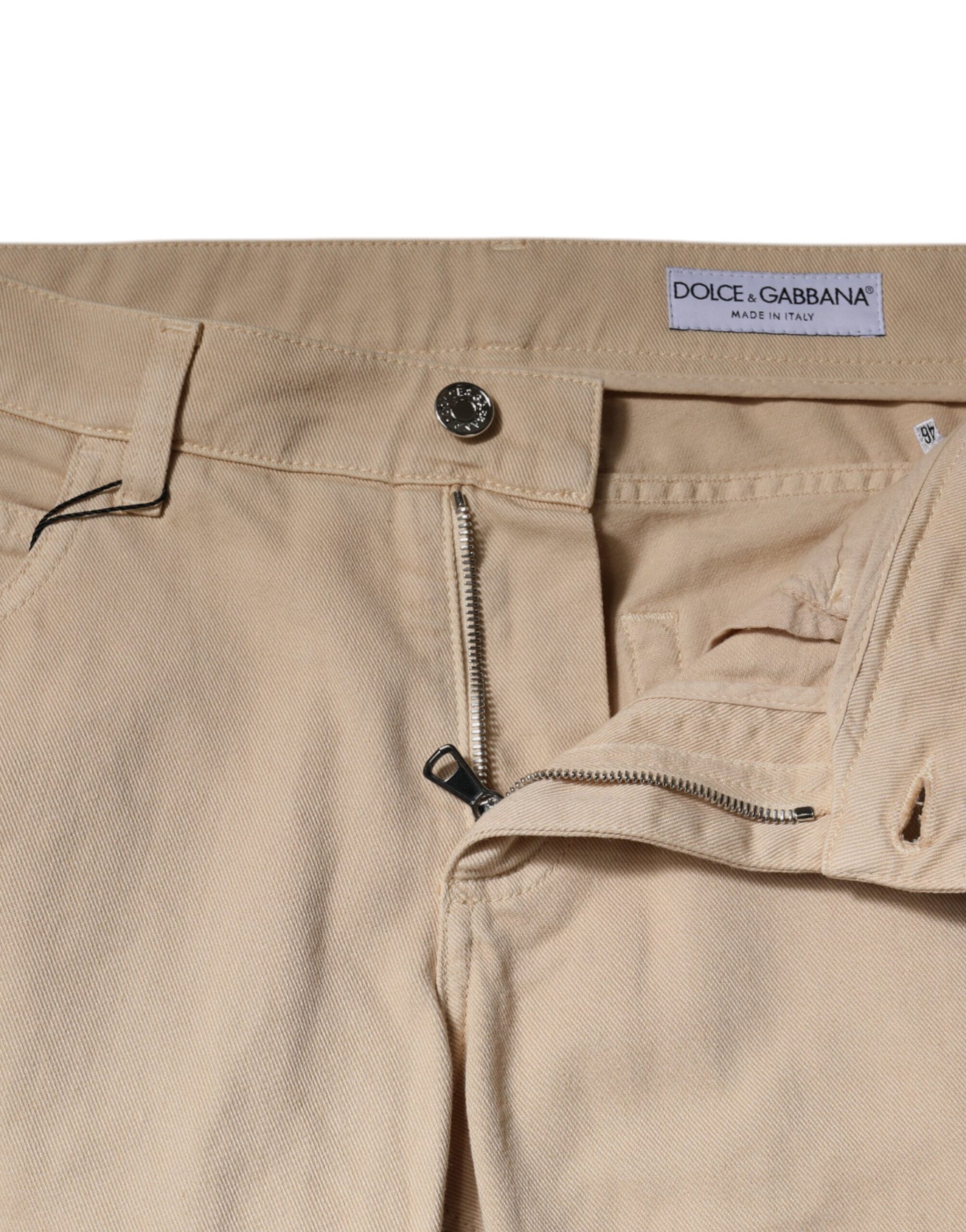 Tan pants with zippered pockets