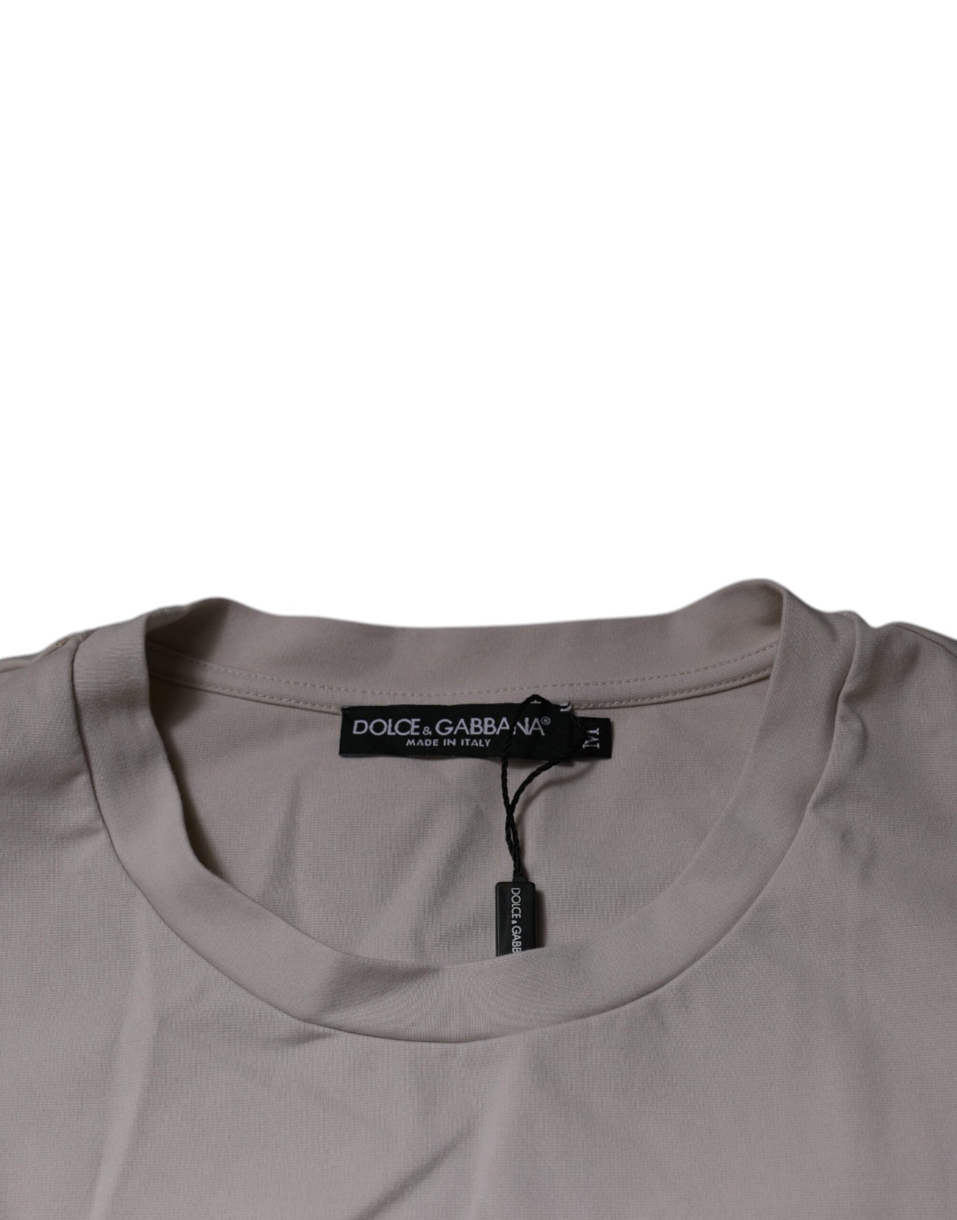 Tan t-shirt on hanger
